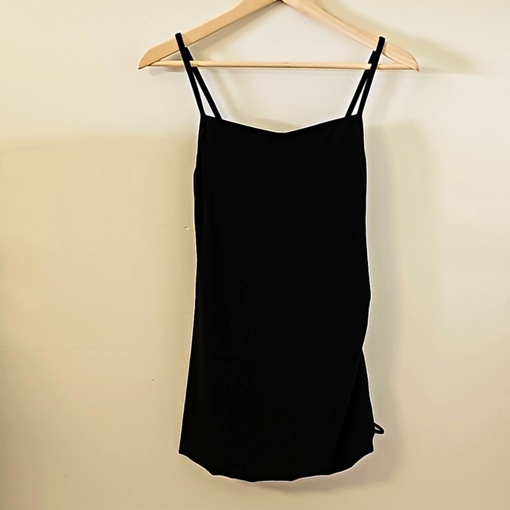 Women's  black one peice bathing suit. Skirt/dress overlay. Modest small.‎